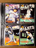 Collect iconic BBM Yomiuri Giants cards featuring Yoshinobu Takahashi and Hideki Okajima. Includes action shots, portraits, and facsimile autographs—ideal for Japanese baseball memorabilia fans.