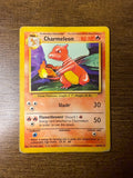 Charmeleon Base Set Pokémon card placed on wood, showing classic artwork and attack details. Front angle 2.