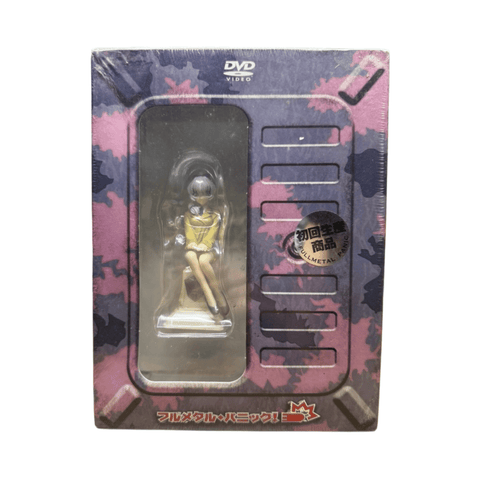 Front view of a Japanese limited edition Full Metal Panic! Mission 5 DVD box set. The box features a purple and pink camouflage pattern with a window on the left revealing a small figurine of Teletha "Tessa" Testarossa in a yellow uniform. A circular silver "Limited Edition" sticker is visible on the right.