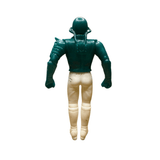 Rear view of the Naval Commander Bosgun sofubi figure from Kamen Rider Black RX (1988). The figure features a green helmet and upper body armor with sculpted ridges and shoulder pads, paired with white pants and boots. Minor black scuff marks are visible on the back of the legs, indicating age or play wear. The figure’s posture and paint application reflect classic 1980s Japanese toy design, emphasizing its collectible and nostalgic value.