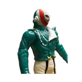 Close-up view of the Naval Commander Bosgun sofubi figure from Kamen Rider Black RX (1988), showing a stylized humanoid character with a full head mask in red, white, and green. The mask features sculpted eye holes and ear coverings. The figure wears a glittery green jacket with sculpted folds and buttons, paired with white pants featuring black vertical stripes. The pose is static with arms slightly bent downward, highlighting the retro tokusatsu villain design.