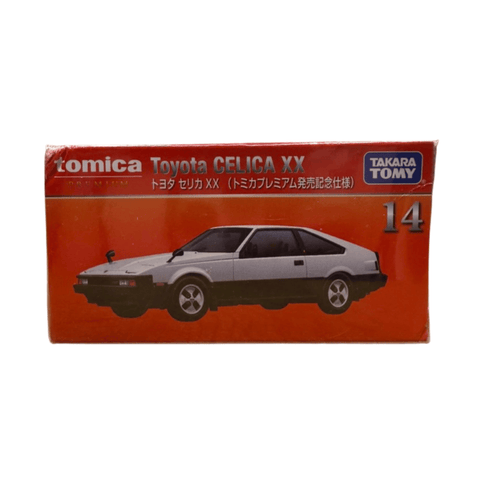 Front of the Tomica Premium No. 14 Toyota Celica XX box showing the silver and black model car illustration, with branding from Tomica and Takara Tomy, and commemorative Japanese text for the release edition.