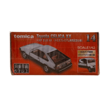 top of the Tomica Premium No. 14 Toyota Celica XX box featuring a silver diecast model with black detailing. Highlights include 1/62 scale, opening doors, retractable headlights, and age suitability for 6 years and up.