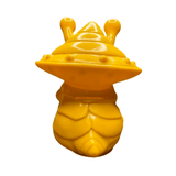 Yellow plastic figurine of Ultra-Luck Money Box Kanegon, designed with a conical head, two antennae-like eye stalks, and a segmented body. The head features a UFO-like rim with small bumps, enhancing its alien-insect hybrid appearance. The smooth, molded surface and whimsical design suggest it is a novelty coin bank or collectible toy inspired by the kaiju character Kanegon.