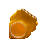 Yellow plastic variant of Ultra-Luck Money Box Kanegon designed with a stylized lion-like head featuring a wide circular opening at the bottom, possibly functioning as a coin slot or container access. The top surface includes printed or embossed graphics and text, though the markings are not clearly legible. The figure has a smooth, molded finish and playful design elements, suggesting it may be a novelty bank or toy inspired by Kanegon’s money-themed character.