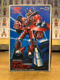  Front of the Red Mechander model kit box featuring the robot in red and black armor with spiked shields, posed against a futuristic background. Includes “1:100 Scale All Plastic Model Kit” and Japanese branding.