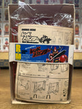 Vintage Red Mechander model kit box with colorful robot artwork and visible instruction sheet. Includes Japanese assembly steps and branding such as “Made in Japan” and “Easy to Assemble.”