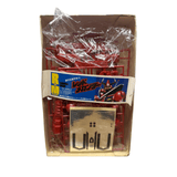 Open box of the Red Mechander plastic model kit featuring red sprue parts, sticker sheet, and packaging insert labeled “1:100 Scale Full Plastic Model Kit” with anime-style robot artwork.