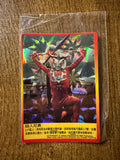 "Ultraman trading card with holographic starburst background and red border. Shows Father of Ultra in a red and silver suit with a horned helmet, standing confidently with hands on hips. Chinese text describes his role as commander of the Space Garrison. English copyright text appears at the bottom."