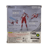 Back of the Ultraman Orb Origin The First S.H.Figuarts packaging showing multiple action poses, effect parts, and Japanese text highlighting features like molding, articulation, and optional accessories. Includes Bandai branding and product details.