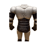 Rear view of a headless Shadowmoon sofubi figure from Kamen Rider Black (1988), showcasing a muscular silver and black sculpt with detailed armor plating on the arms, torso, and legs. Embossed Japanese text on the upper back reads “© 石森プロ ・東映動画 東 映,” and the lower back is marked “BANDAI 1987 JAPAN,” confirming its official licensing and production origin. The absence of the head highlights the figure’s modular design or wear, relevant for condition grading and authenticity verification.