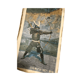 Vintage printed card featuring a character dressed in traditional samurai armor, posed dynamically with legs apart and arms extended while aiming a long bow with orange and black segments. The figure wears a helmet with a crest, chest plate, and full arm and leg protection. A quiver is visible on the back. The background shows rocky terrain and a stream, suggesting an outdoor setting. Japanese copyright text at the bottom reads “©石森プロ・NET 東映,” linking the image to Ishimori Productions, NET, and Toei—indicat