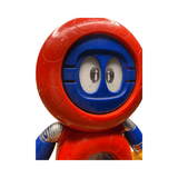 Close-up of the Batten Robomaru GB-94 figure’s torso, featuring a red circular chest with a transparent window. Inside the window is a cartoon character with a red helmet, antennae, and large round glasses, smiling cheerfully. The legs are yellow with black rectangular designs and metallic joints. This internal character detail adds charm and depth to the toy’s design, blending mechanical and animated elements.